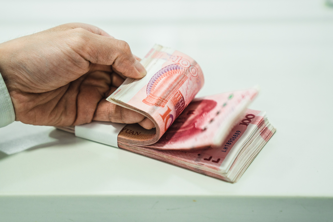 One-hundred yuan banknotes. Photo: Bloomberg